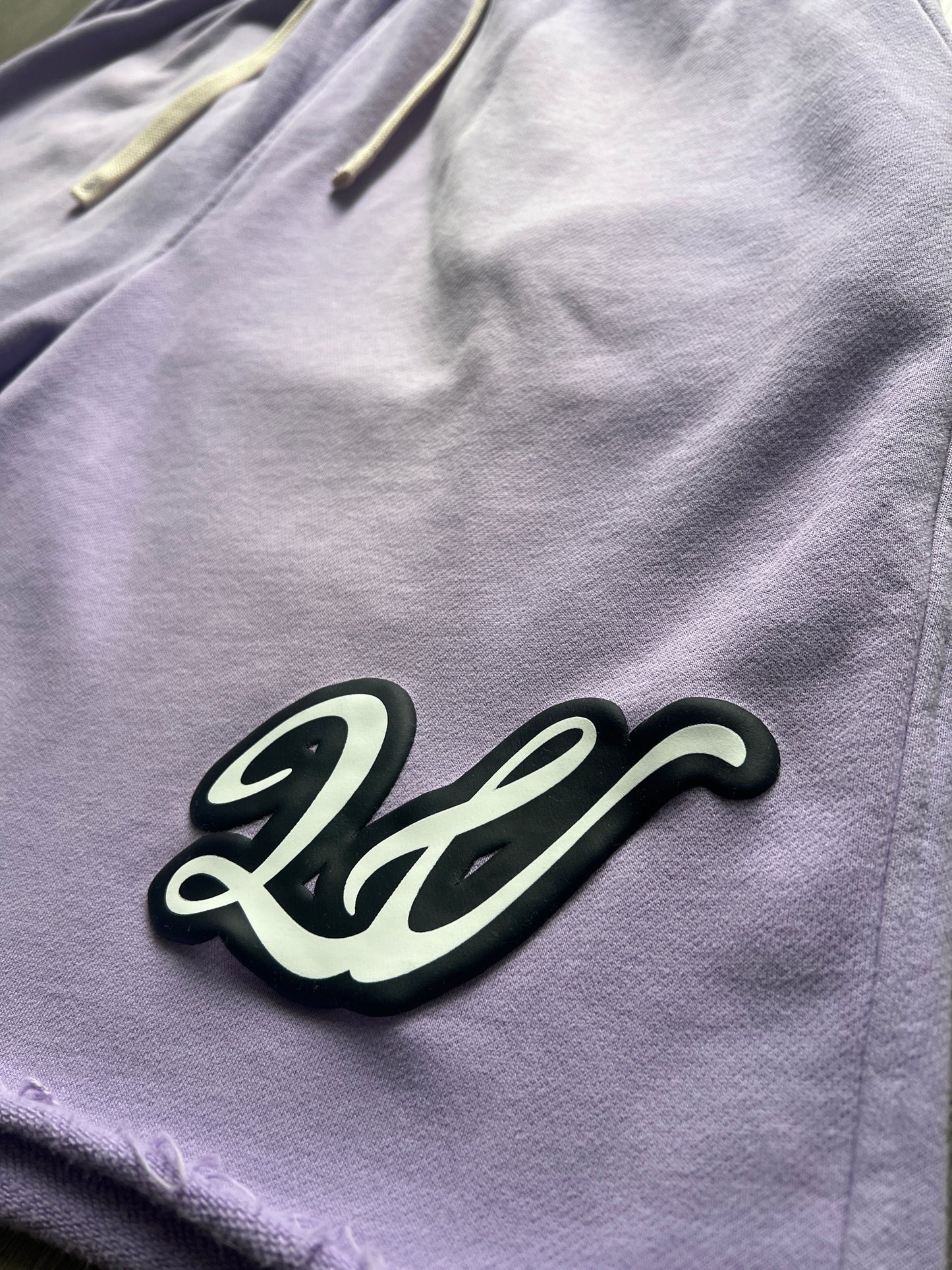 LIGHT PURPLE ACID WASH LAWVILLE SHORTS