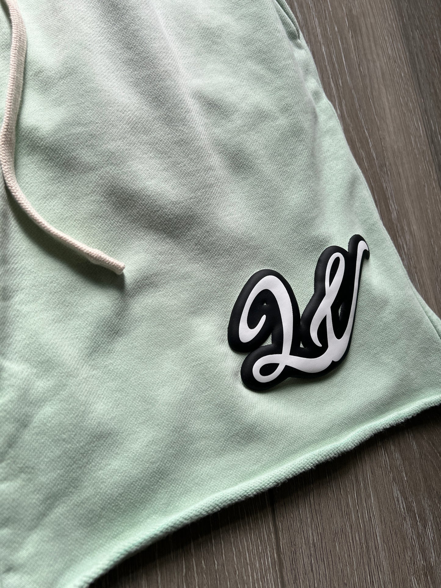 LIGHT GREEN ACID WASH LAWVILLE SHORTS